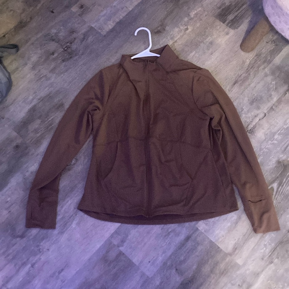 brown define jacket! fits well and goes with all sorts of clothing!